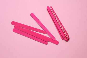 Nail files on a pink background