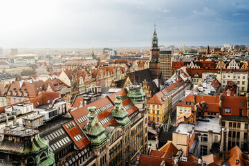 Obraz premium Medieval architecture of Wroclaw city in Poland, view from above to colourful roofs. Scenic old town in Europe.