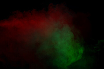 Blue and green steam on a black background.