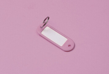 Label or tag key ID. Keychain with white space for text. Template for design. Pink background