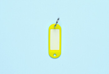 Label or tag key ID. Keychain with white space for text. Template for design. blue background