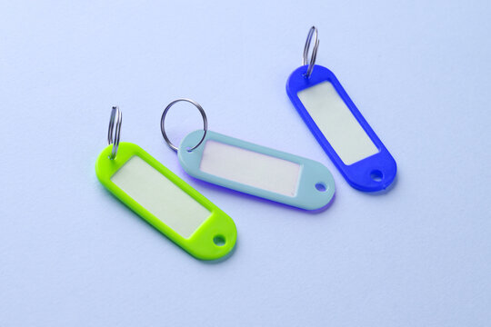 Plastic key tags on b blue background