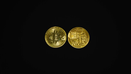 Bitcoin. Golden coins with bitcoin symbol isolated on black background. Digital currency. Block chain. Cryptocurrency