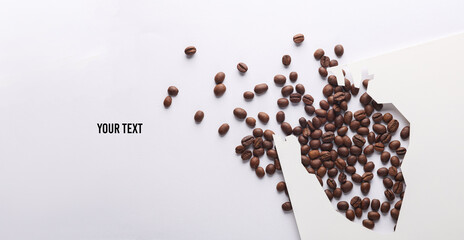 Heart shaped hole with coffee beans. Copy space for your text and information