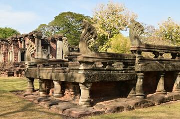 Seven heads Naga sand stone carving statue of Prasat Hin Phimai in Phimai Historical Park. One of...