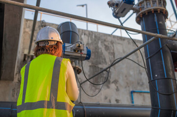 Environmental engineers work at wastewater treatment plants,Water supply engineering working at...
