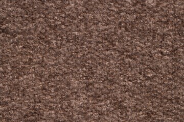 Texture of brown woven fabric as background, top view