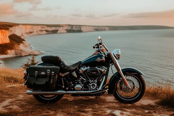 Obraz premium Classic Motorcycle by the Sea at Sunset