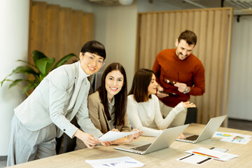 Team collaboration in a modern office environment during a productive brainstorming session