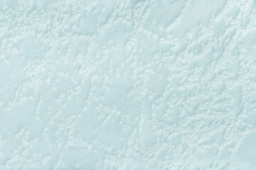 Texture light blue velvet background from upholstery textile material, macro. Abstract pastel sky velour fabric