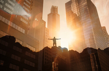 Man in city finding inner strength, courage and power. Stand strong concept.	