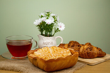 Waffle, croissants on the table. Waffle made at home. Homemade cakes