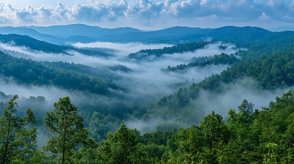 Misty mountain landscape at dawn.