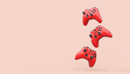 Realistic red azure video game joysticks or gamepads on pink background