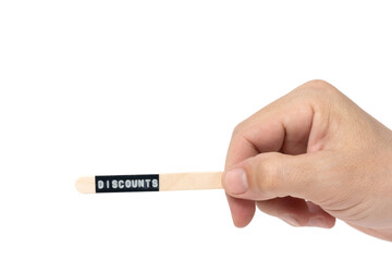 Hand holding wooden stick with word Discounts isolated on white background.