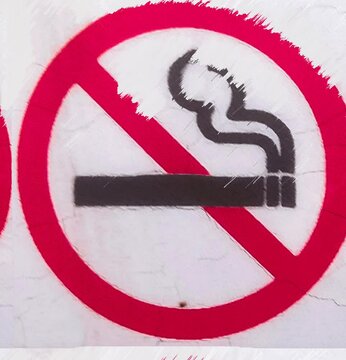 Animated prohibition sign with psychedelic red and black visual effects. Ideal seamless loop for smoking ban campaigns, workplace safety videos, and educational content.