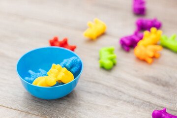 Yellow and blue toys for a child. How Ukrainian children play. Children during the war in Ukraine....
