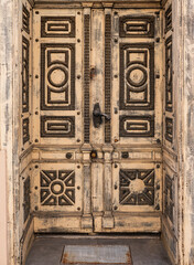 Detail of ornaments on old wooden door