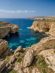 Rocky coast on a sunny day along Gozo Island, Malta.1
