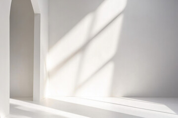 Modern, minimalist interior space with a focus on clean lines and a stark, white color palette. Presentation backdrop with beautiful intricate lighting against a blank white wall.