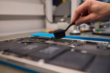 Cleaning a circuit board is vital in electronics repair for ensuring quality and precision