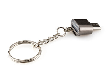 Silver USB type-C card reader isolated on white background.