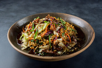 Yakisoba, traditional Asian noodles with meat and vegetables.