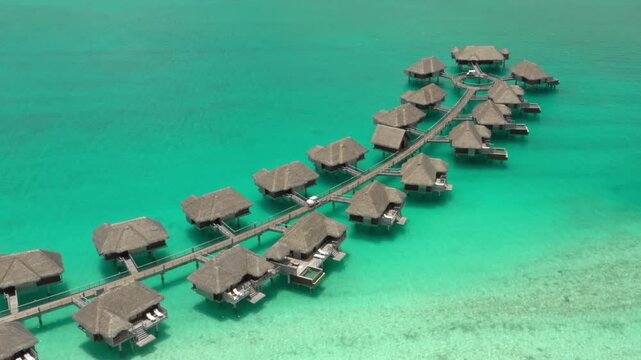 Tropical exotic Bora Bora island, turquoise lagoon and luxury travel resort