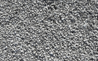Bright white gravel stones forming a uniform surface close-up