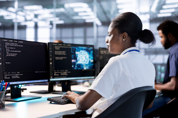 Server farm IT expert doing AI research, creating and implementing algorithms using neural...