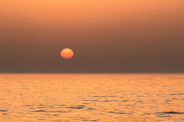 Contemplado el atardecer con calima