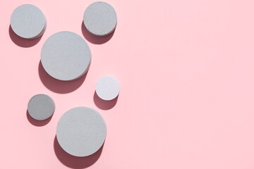 Set of round building blocks on pink background