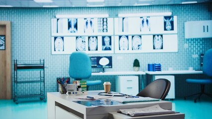 Empty doctor office awaiting a patient visit featuring diagnostic equipment and medical technology,...