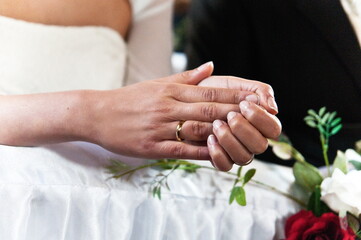 hands with the ring
