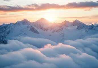 Majestic Snow-Capped Mountains Under a Dramatic Sunrise Surrounded by Soft Clouds in the Beautiful Alpenglow of Dawn