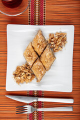 Traditional Turkish dessert; Handmade walnut baklava. Turkish name; cevizli baklava. Walnut Baklava...