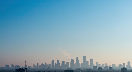 Obraz premium Morning city skyline with skyscrapers under clear blue sky