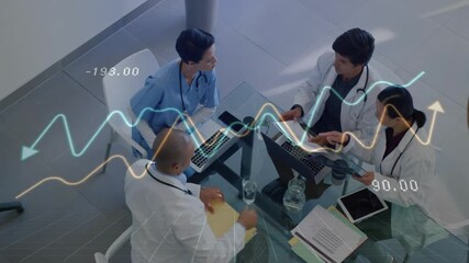 Discussing data, medical team with financial graph animation in hospital setting - Powered by Adobe