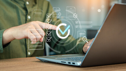 Man finger touch check mark, digital documents and files hologram. Copy space, business process...