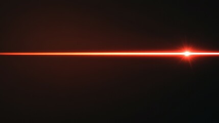 Fototapeta premium A bright red light shining across a dark background