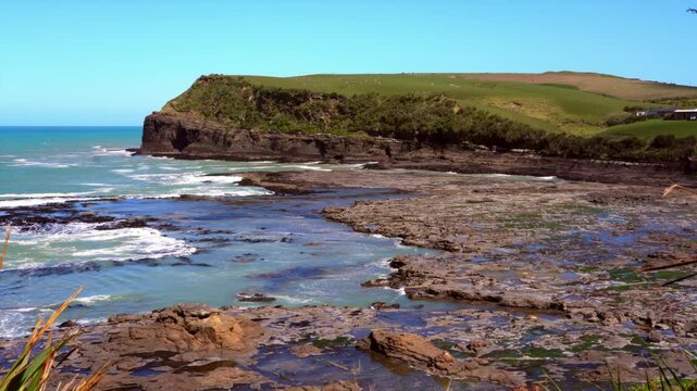 Curio Bay Rugged Coastal Landscape at Low Tide on a Sunny Day - Scenic New Zealand
