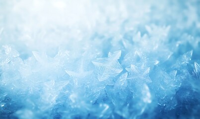 Obraz premium Delicate frost crystals glisten on a cool blue background, creating a serene winter ambiance.