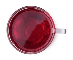 Delicious hibiscus tea in glass cup isolated on white, top view