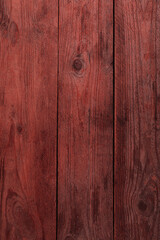 Fototapeta premium Texture of red wooden surface as background, closeup