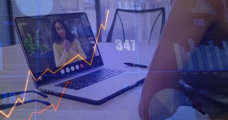 In office, businesswoman on video call with animation of financial graphs and charts - Powered by Adobe