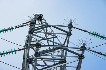 Bird protection and glass insulators on a power transmission line pole
