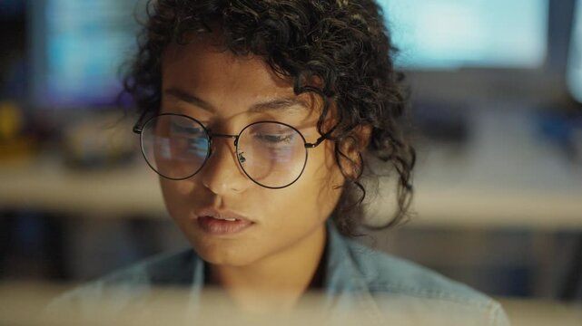 A concentration of creativity and code, her networked intelligence shines through the night.
