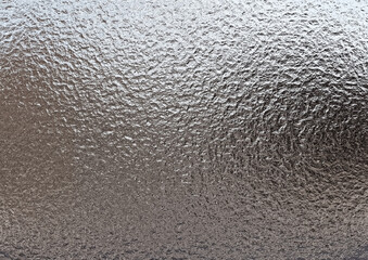 ざらざらした質感の金属の表面の抽象的な背景