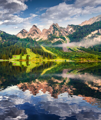 Misty summer morning on the Vorderer Gosausee lake