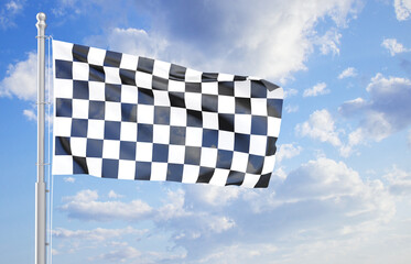 Checkered flag waving in the wind against the cloudy sky. Rally concept